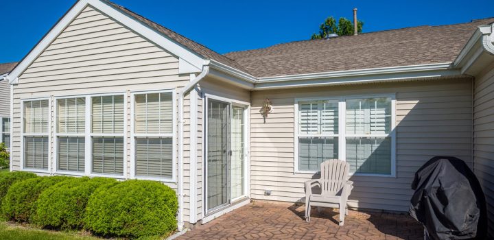 A house with a beige vinyl siding making the house look more aesthetic