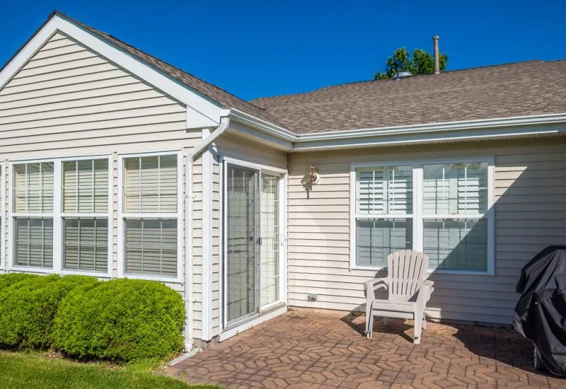 A house with a beige vinyl siding making the house look more aesthetic